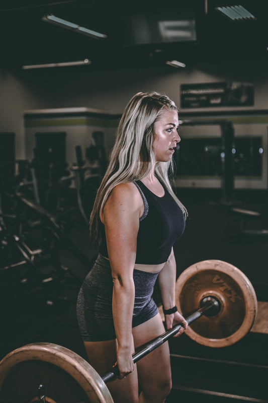 woman deadlifting